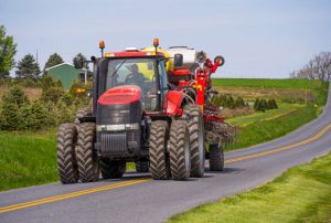 Farm equipment on rural road