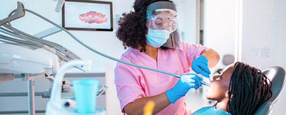 dental technician with gloves
